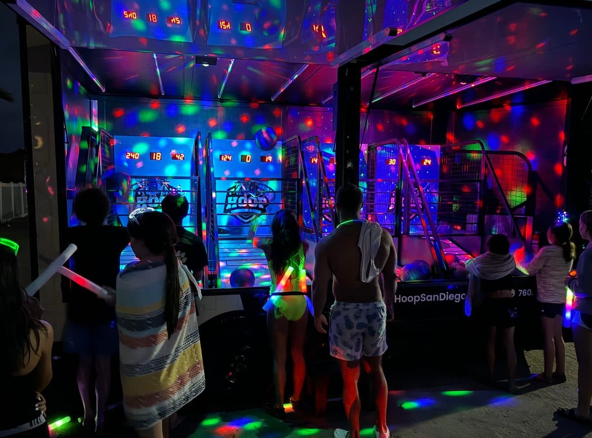 Night glow party with lights inside the arcade basketball trailer